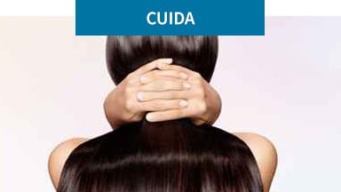 La imagen de fondo muestra a una mujer de espaldas luciendo su cabello largo. Productos Satinique, limpia y acondicionan tu cabello.